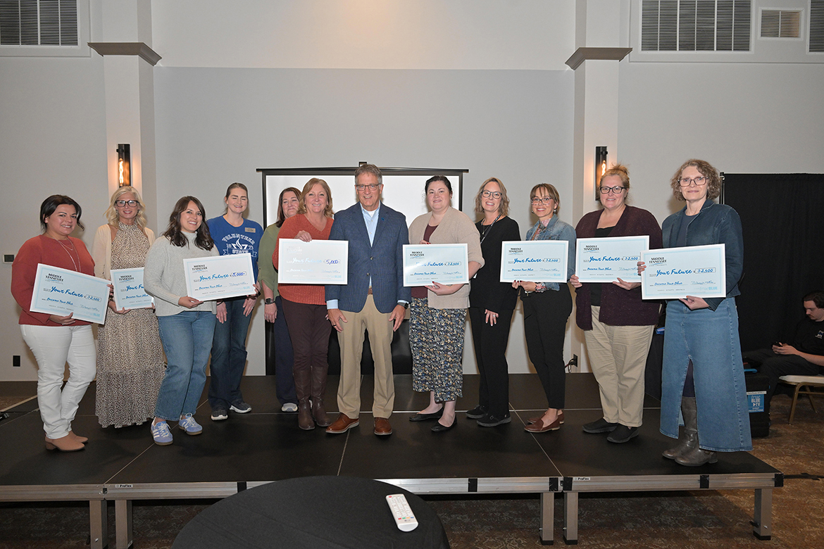 Counselors and representatives from eight schools received a total of $25,000 in scholarships to award to their students during the Middle Tennessee State University True Blue Tour luncheon Thursday, Oct. 23, at Grasslands Country Club in Gallatin, Tenn. For sending the most students MTSU’s way, Vol State and Beech High School received $5,000 scholarships. (MTSU photo by James Cessna)