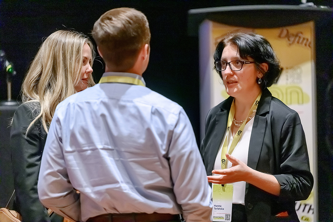 Hanna Terletska, right, director of the Quantum Research Interdisciplinary Science and Education Center at Middle Tennessee State University, answers questions from two people attending during the recent Tennessee Department of Economic and Community Development Governor’s 2025 Conference at the Embassy Suites by Hilton in Murfreesboro, Tenn., following her participation in a “Research in Action” panel. (MTSU photo by Andy Heidt)