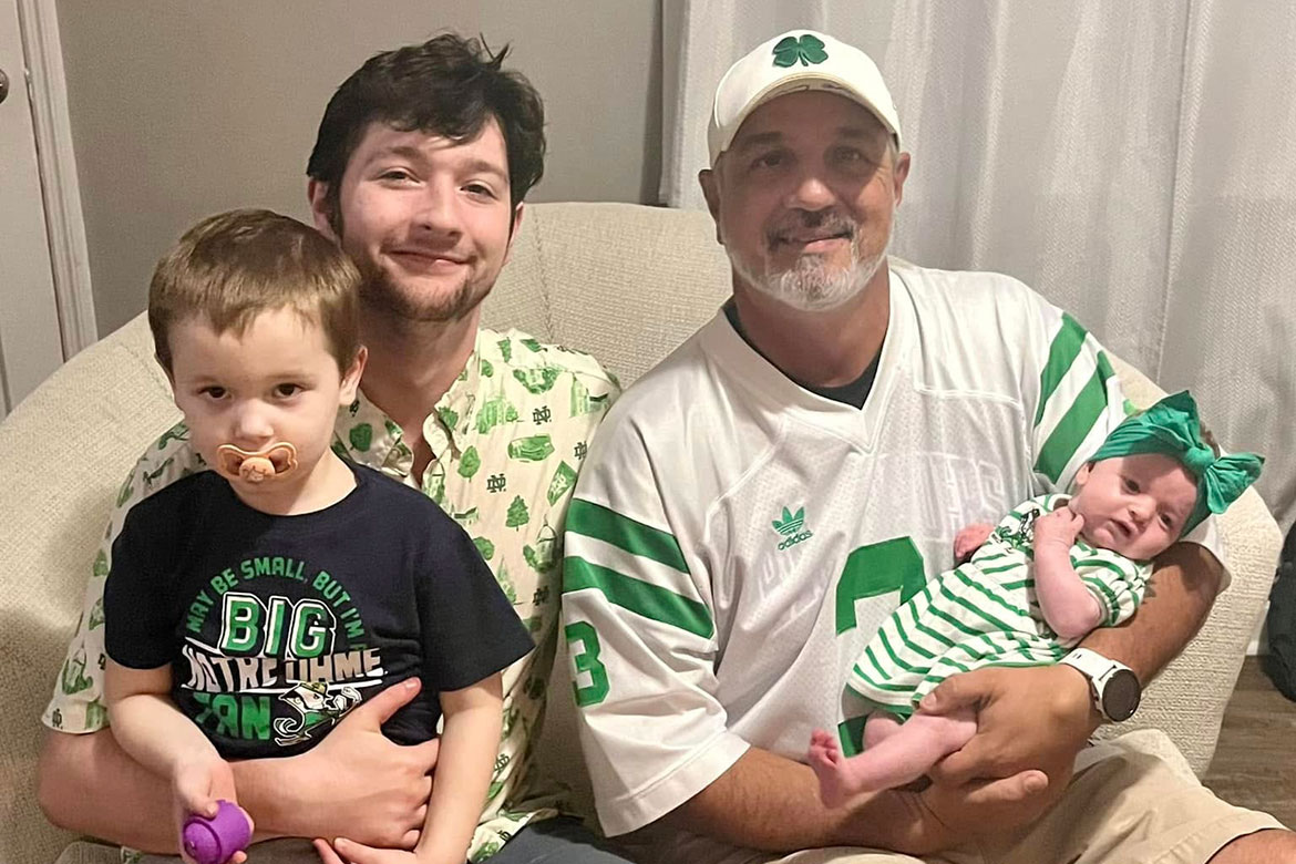Middle Tennessee State University nontraditional student Stan Laws, right, will graduate in December with his bachelor’s degree after returning to college after retiring from the Tennessee National Guard. In this photo, he holds his young granddaughter, Navy, with his son, Conner, left, and grandson, Nolan. (Submitted photo)
