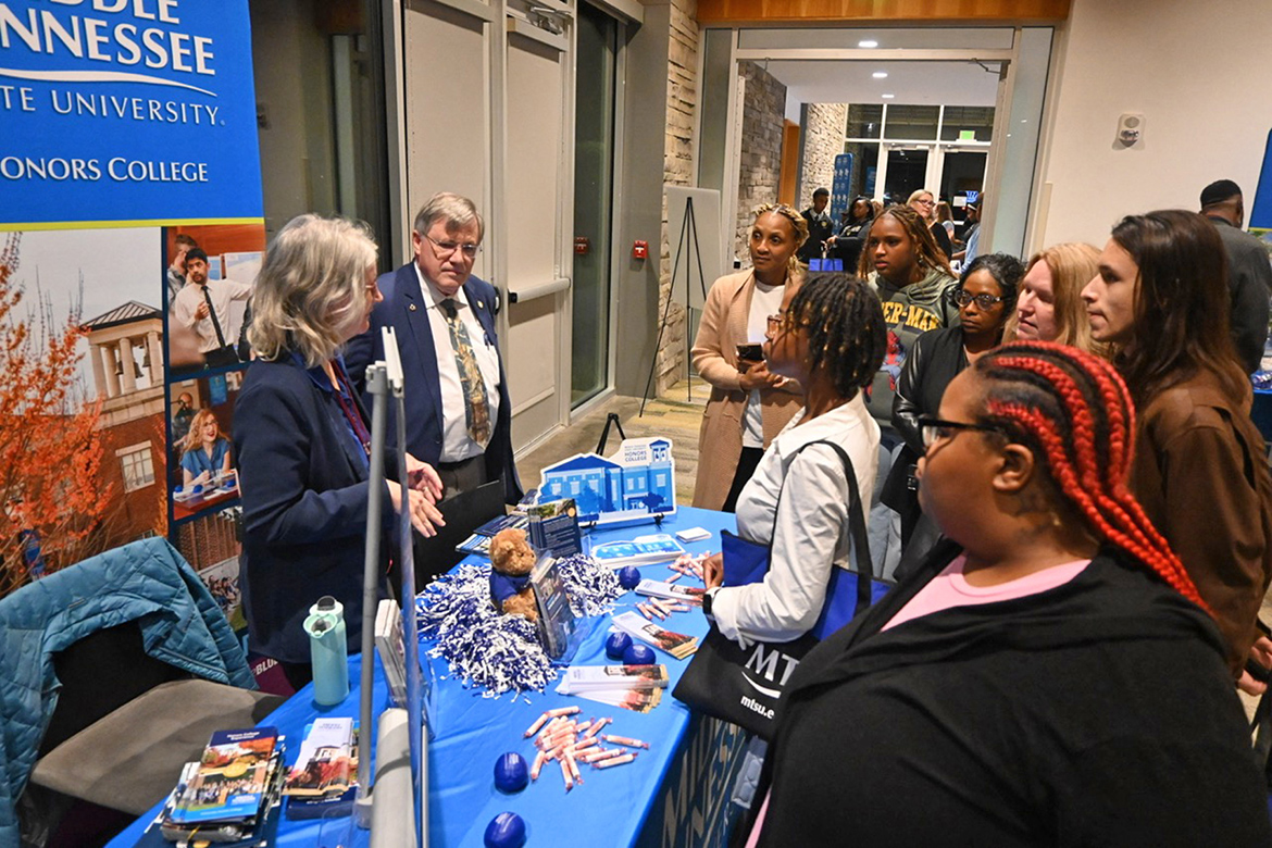 Middle Tennessee State University Honors College representatives Laura Clippard and Dean John Vile, left, share information about the Murfreesboro, Tenn., university’s programs during its True Blue Tour stop on Nov. 4 at the FedEx Event Center at Shelby Farms in Memphis, Tenn. (MTSU photo by Jimmy Hart)