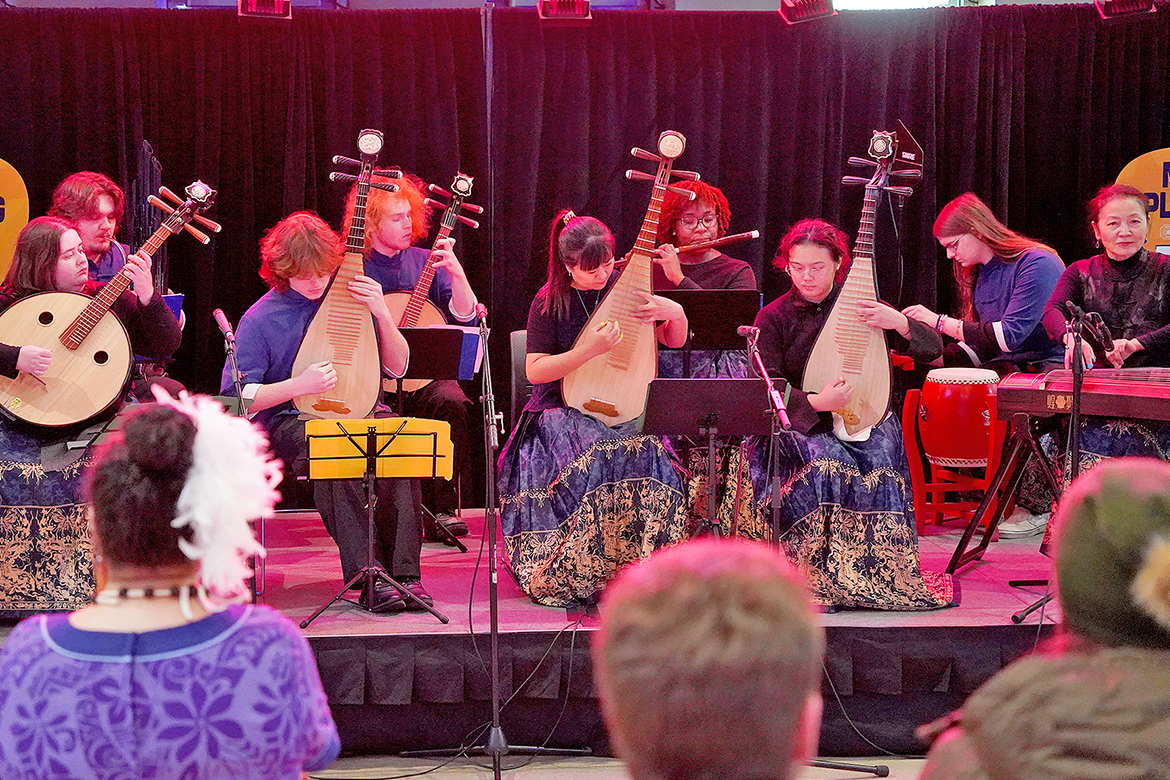 Members of the Chinese Music Ensemble at Middle Tennessee State University in Murfreesboro, Tenn., perform in the Bridgestone Arena concourse before the Nashville Predators game on Dec. 9 as part of Asian and Pacific Islander music heritage night. Performing are, front row, from left, student Kylei Loh, volunteer Bo Capistrant, Chinese Scholar Jingyi Zhan, student Ani Heng, and Chinese Music and Culture Center Director Mei Han; and back row, from left, student Henry Wright, volunteer Jake Capistrant, student Jaida Anthony and student William Sprayberry. (MTSU photo by Mike Davis)
