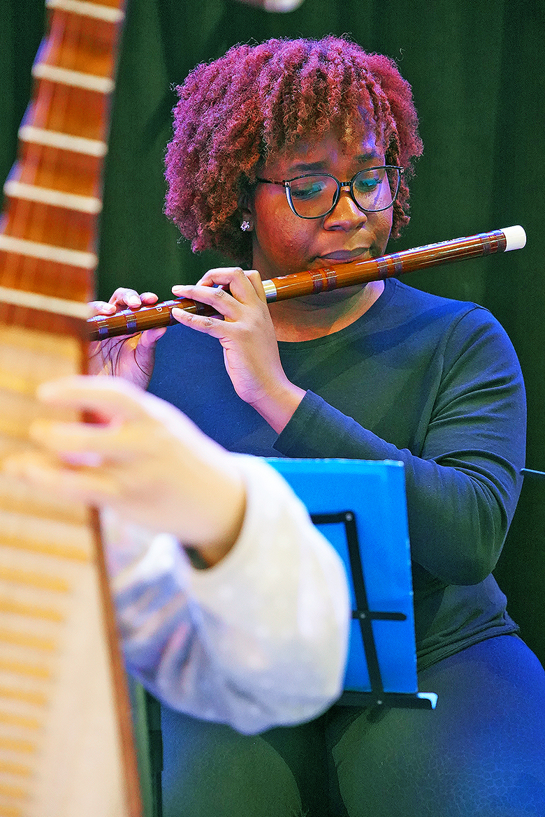 Jaida Anthony, a music major at Middle Tennessee State University in Murfreesboro, Tenn., and member of the MTSU Chinese Music Ensemble, plays the dizi during the ensemble’s performance at Bridgestone Arena in Nashville, Tenn., for Asian and Pacific Islander music heritage night on Dec. 9. The ensemble is part of MTSU’s Center for Chinese Music and Culture, the only university-based Chinese music center in the United States. (MTSU photo by Mike Davis)