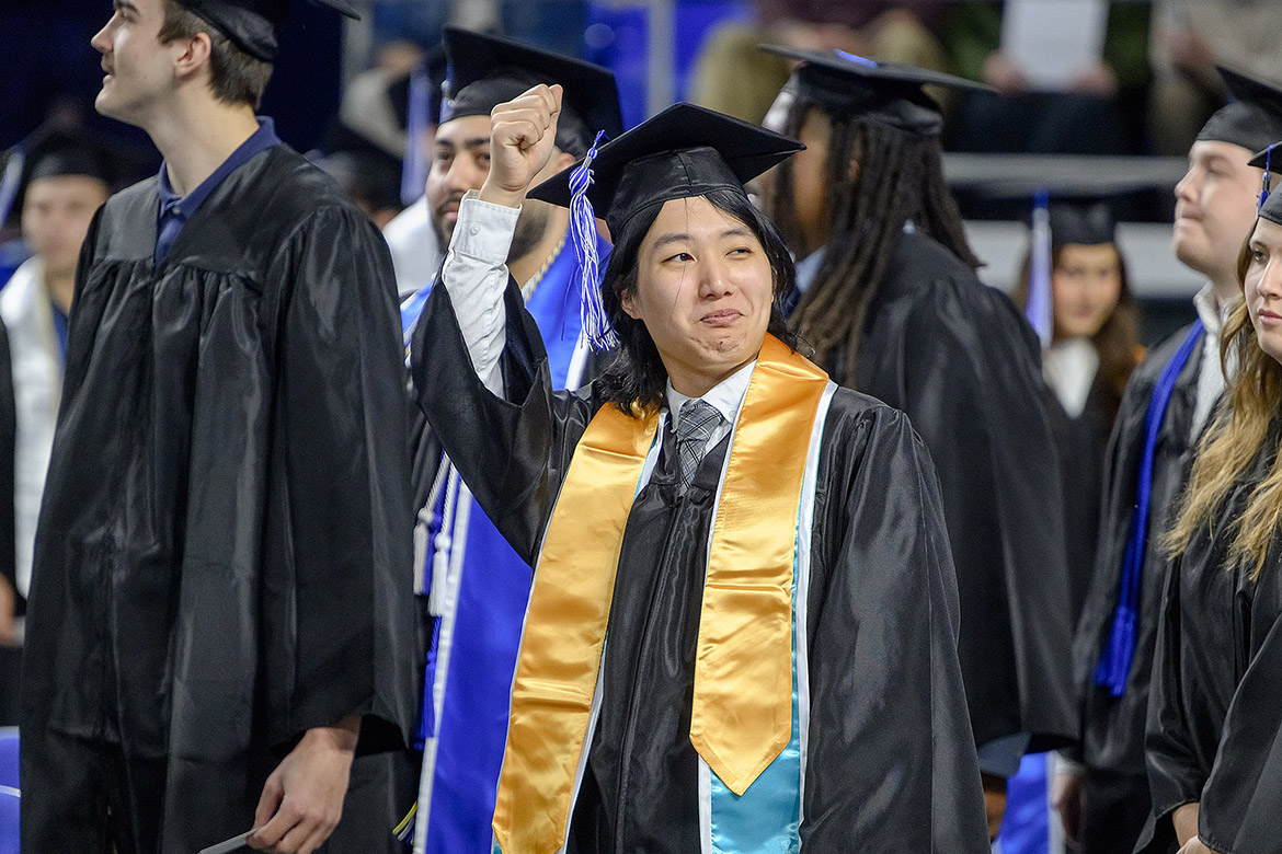 A Middle Tennessee State University graduate gives a fist pump to celebrate earning his degree during the fall 2025 afternoon commencement ceremony that conferred degrees for more than 1,600 Blue Raiders in two ceremonies on Saturday, Dec. 13, inside Murphy Center on campus in Murfreesboro, Tenn. (MTSU photo by Andy Heidt)