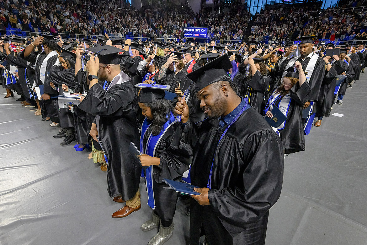 More than 1,600 Middle Tennessee State University graduates move their tassels from right to left as acknowledgment of earning their degrees during the fall 2025 afternoon commencement ceremony held Saturday, Dec. 13, inside Murphy Center on campus in Murfreesboro, Tenn. (MTSU photo by Andy Heidt)