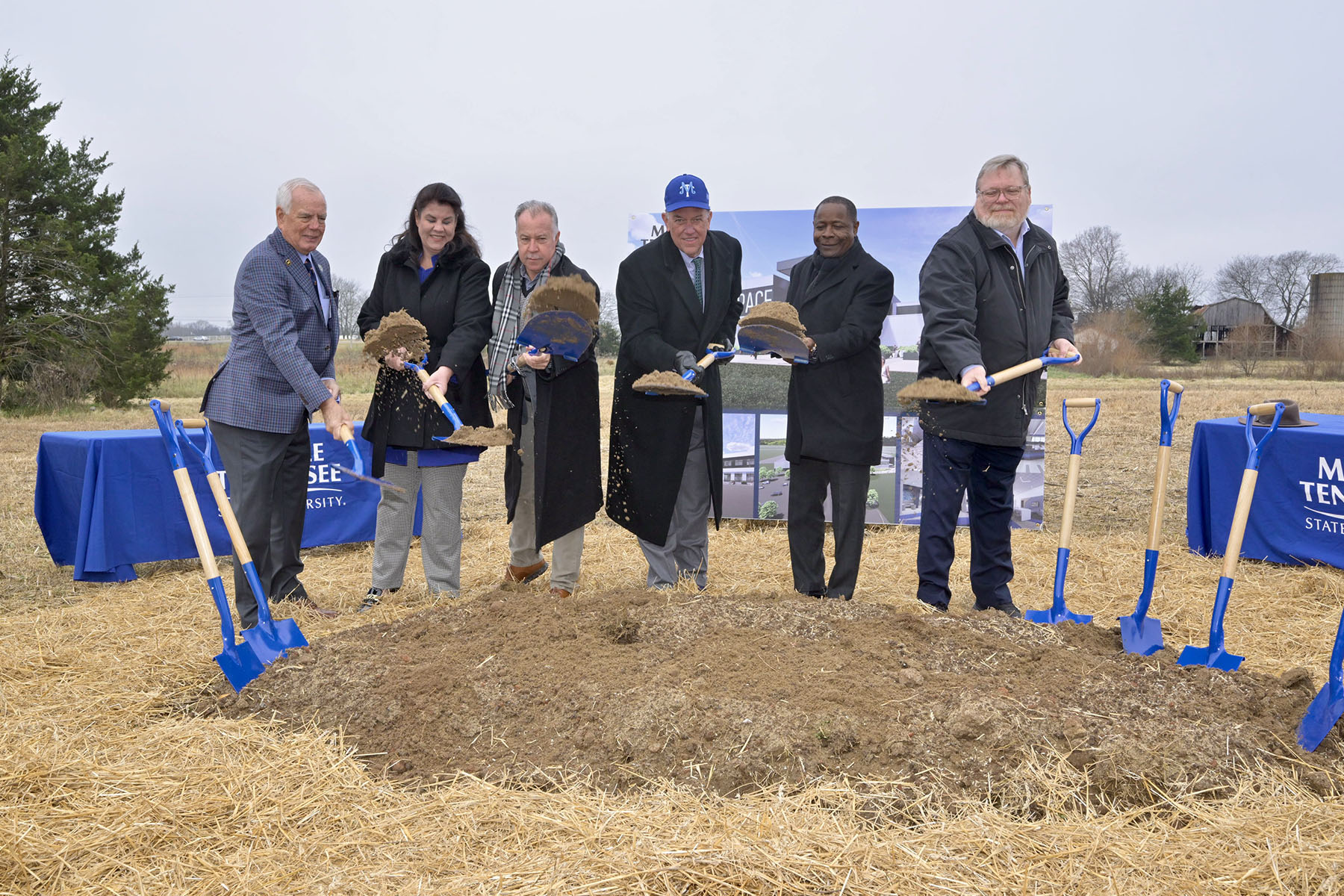 Performing the ceremonial shoveling of dirt during the groundbreaking ceremony held Wednesday, Dec. 3, for the new $73.4 million Middle Tennessee State University Aerospace facility that will be built at the Shelbyville Municipal Airport in Shelbyville, Tenn., are, from left, state Rep. Pat Marsh, state Sen. Dawn White, state Rep. Mike Sparks, MTSU Board of Trustees Chair Steve Smith, MTSU President Sidney A. McPhee; and state Rep. Tim Rudd. (MTSU photo by Andy Heidt)