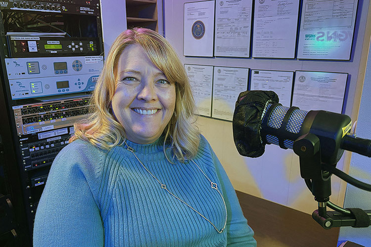 Lexy Denton, assistant director of the Engage program at Middle Tennessee State University, discussed the academic program and activities surrounding its 10th anniversary this year as a guest on the WGNS Radio “Action Line” program on Dec. 15 from the station’s studio in downtown Murfreesboro, Tenn. (MTSU photo by Nancy DeGennaro)