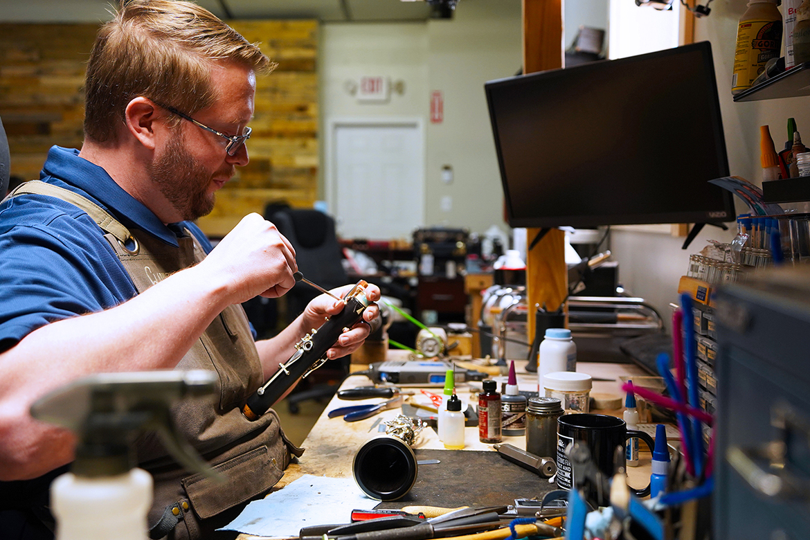 Jonathan Copeland, owner of Clarinets by Copeland and an alumnus of Middle Tennessee State University in Murfreesboro, Tenn., repairs a clarinet for a client in his workshop in Shelbyville, Ky., on Jan. 12, 2026. Copeland and his wife, Ashley, built the business from a small repair operation into an internationally known shop that restores and produces professional clarinets. (MTSU photo by Mike Davis)