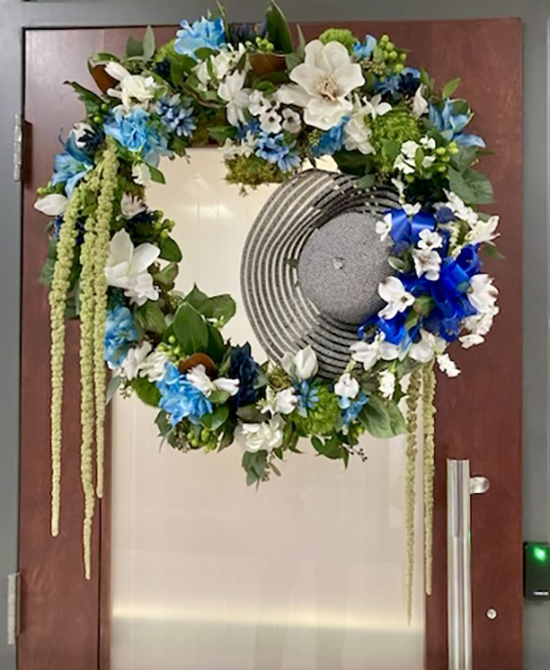 Employees in Middle Tennessee State University’s Cope Administration Building raised money Friday, Jan. 9, and placed memorial wreaths in honor of late First Lady Elizabeth McPhee on the office doors of her spouse, MTSU President Sidney A. McPhee. (MTSU photo)