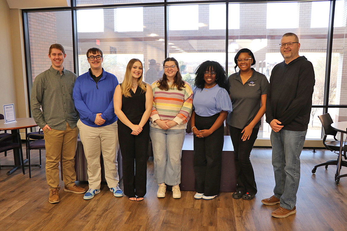 Pictured inside the Bragg Media and Entertainment Building on the Middle Tennessee State University campus in Murfreesboro, Tenn., are, from left, MTSU School of Journalism and Strategic Media students Brett Walker, Willie Phaler, Bailey Lowe, Callie Welch, Jaeda Jackson and Brianna Sorrell with Mark Milsap, executive director of the Tennessee Press Association, ahead of the university’s participation in the Potter Ambassador Program that allows the MTSU students to work at community newspapers throughout the state. (Submitted photo)