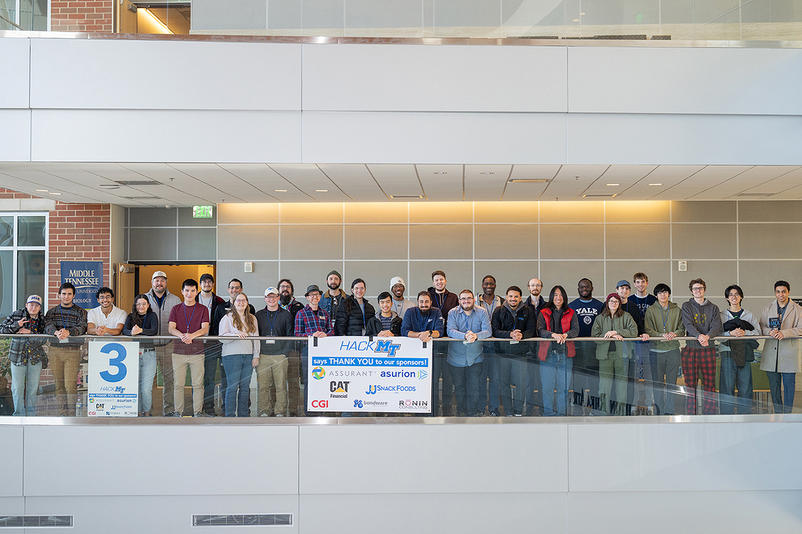 Alumni, current students and faculty gather at the Science Building atrium at Middle Tennessee State University in Murfreesboro, Tenn., for the final day of the 11th annual MTSU Computer Science Department HackMT, a 36-hour hackathon held on campus Friday, Jan. 30, through Sunday, Feb. 1. The event showcased app, computer and web projects. (MTSU photo by Cat Curtis Murphy)