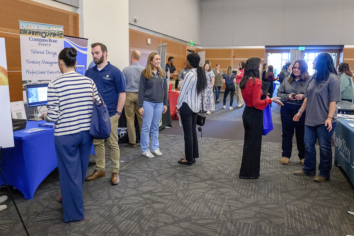 Students at Middle Tennessee State University in Murfreesboro, Tenn., talk with vendors from across the region at the 2025 Tourism and Hospitality/Leisure and Sport Management Career Fair held in the Student Union Ballroom on campus. This year’s event — open to MTSU students and alumni — is set for Tuesday, Feb. 24, in the ballroom. (MTSU file photo by J. Intintoli)