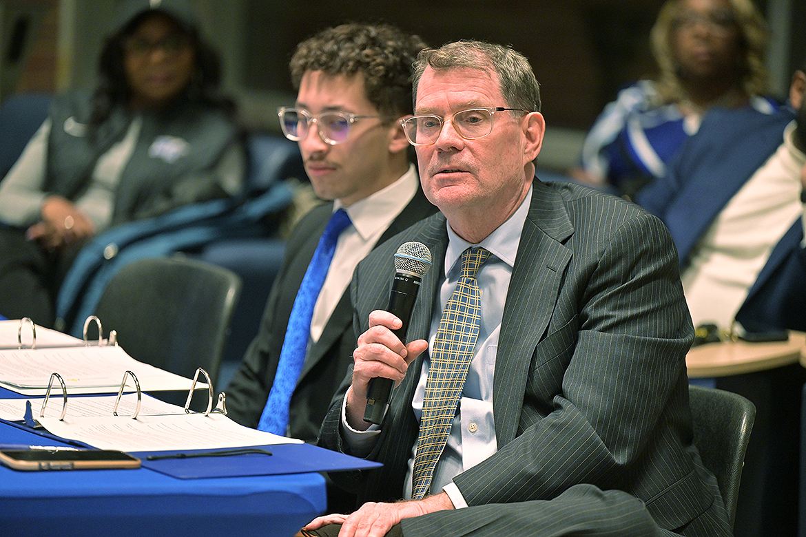 Luis Esmurria III, an accounting major from Clarksville, Tenn., and election commissioner for the Student Government Association at Middle Tennessee State University in Murfreesboro, Tenn., listens to Danny Kelley, interim vice president for Student Affairs and dean of students, poses questions to SGA presidential and vice presidential candidates during a debate held in the Student Union Atrium on Monday, Feb. 23, ahead of the SGA officer election, which takes place on campus Monday-Friday, March 2-5. (MTSU photo by James Cessna)