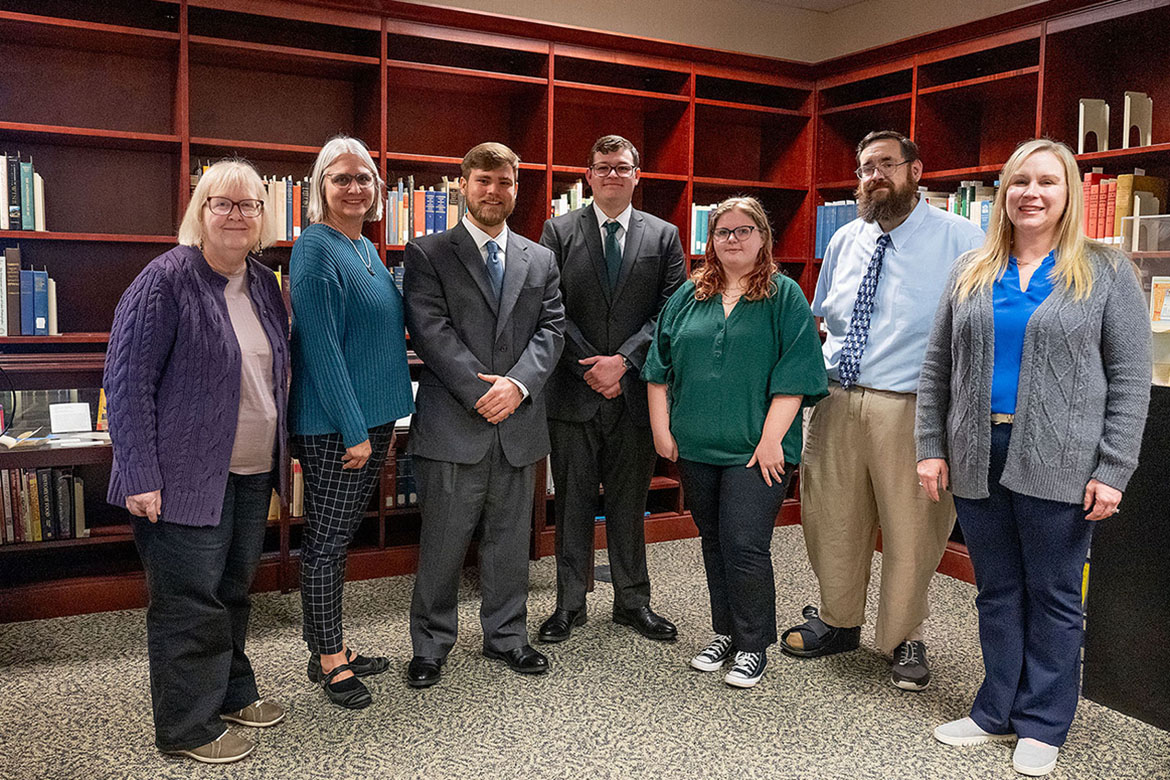 Participating in the “Poisoned Pages” project in Special Collections at James E. Walker Library at Middle Tennessee State University in Murfreesboro, Tenn., are, from left, Susan Hanson, Special Collections curator; Susan Martin, Special Collections librarian; Brantley Harriman, Ethan Coyle and Brittney Cupp, student co-leads on the project; Jessie Weatherly, chemistry lab instrument support engineer; and Sarah Pierce, chemistry instructor. (MTSU photo by Cat Curtis Murphy)