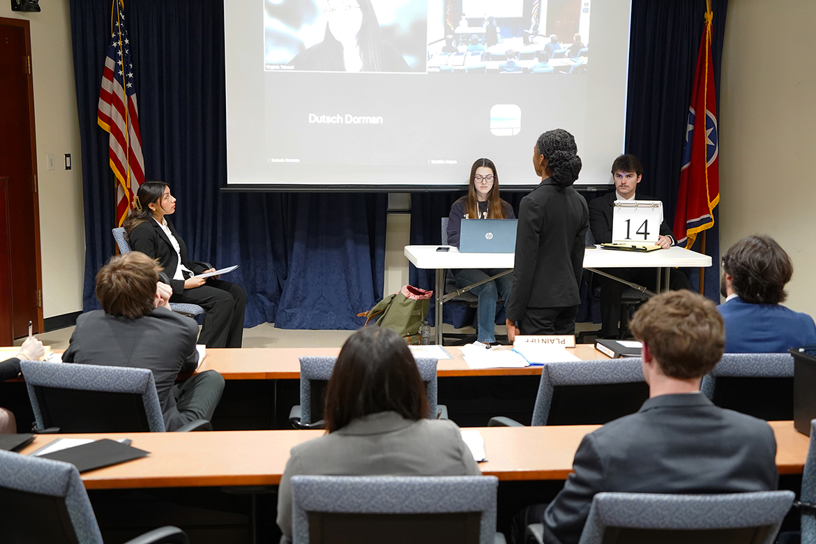Renee Tetteh, standing, a student on the Mock Trial Team at Middle Tennessee State University in Murfreesboro, Tenn., examines a witness during a mock trial scrimmage at MTSU on Feb. 16, 2026. Mock trial places students in simulated courtroom settings where they take on roles such as attorneys and witnesses. (MTSU photo by Mike Davis)