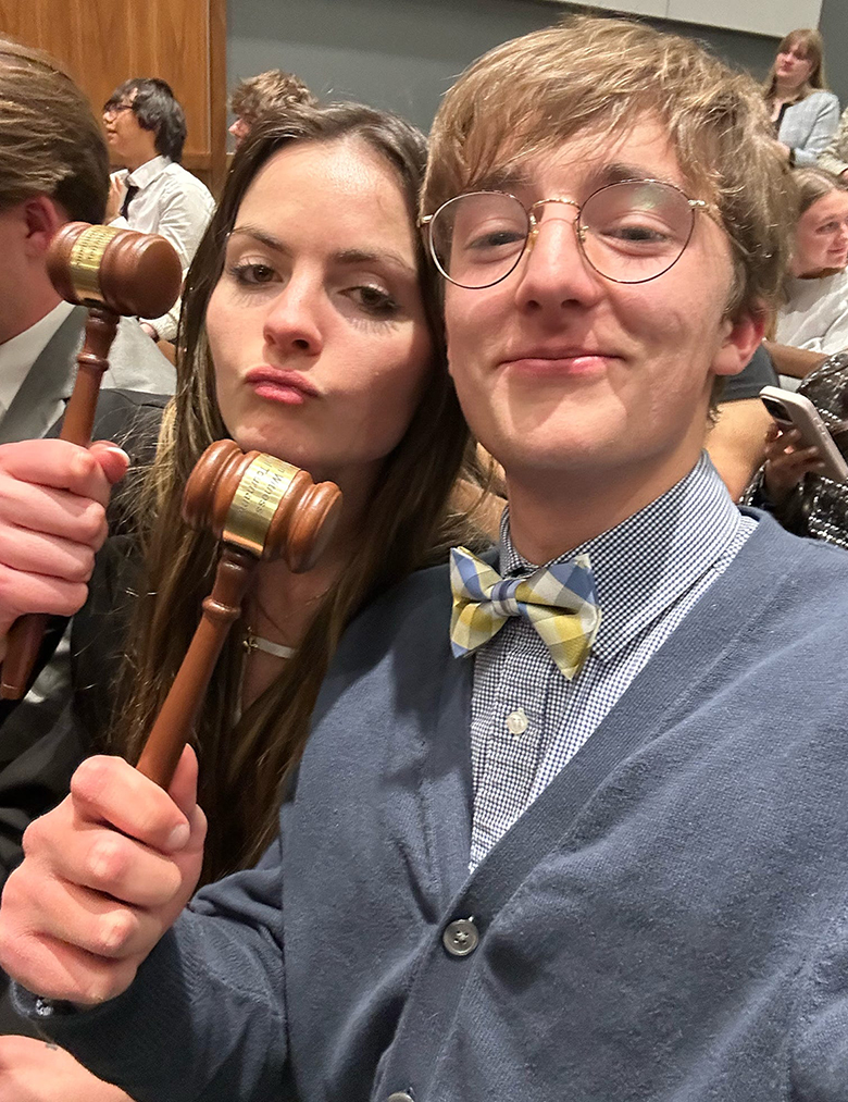 Jessie Dicker, left, and Henry Vance pose for a photo holding their awards earned for outstanding attorney and outstanding witness, respectively, at the American Mock Trial Association regional tournament held Feb. 24 at the University of Tennessee in Knoxville. Both students competed as members of the Mock Trial Team from Middle Tennessee State University in Murfreesboro, Tenn., during the 2025–26 season. (Submitted photo)