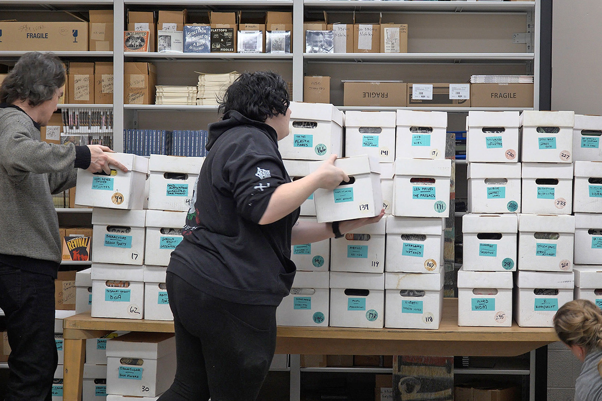 Boxes of Maximum Rocknroll’s punk music archives are sorted and organized after being delivered in early February to the Center for Popular Music in the Bragg College of Media and Entertainment Building at Middle Tennessee State University in Murfreesboro, Tenn. (MTSU image by Karli Sutton)