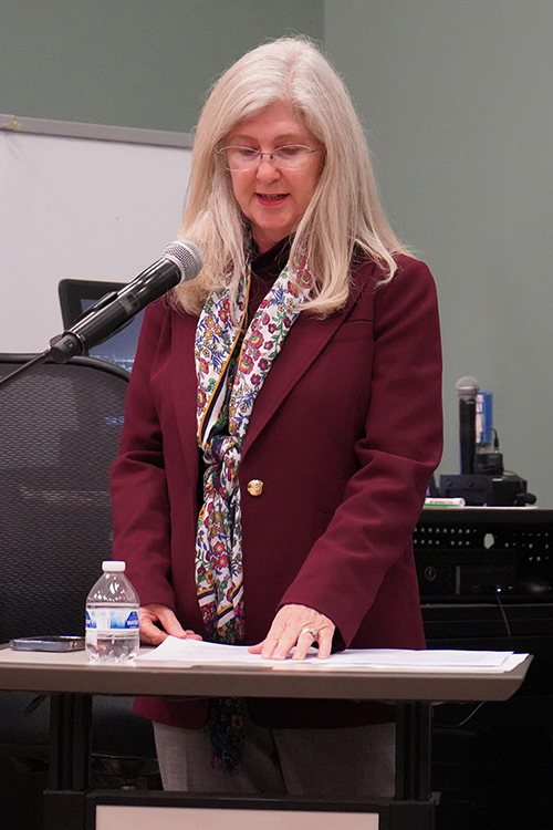 Middle Tennessee State University Honors College professor Joan McRae moderates a panel discussion featuring faculty members Sean Foley, Luke Truxal and Andrei Korobkov, who offered their expertise about the current war in Iran on Thursday, March 19, at the College of Education Building on campus in Murfreesboro, Tenn. (MTSU photos by Robin E. Lee)