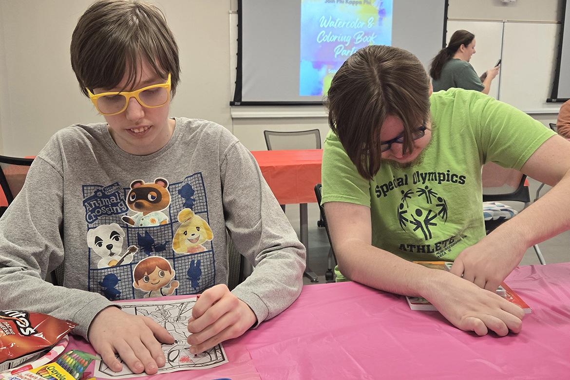 Two young participants with the Ables Recreation Association put their artistic skills to work during the Watercolor and Coloring Book Night on Valentine’s Day co-hosted by the association and Phi Kappa Phi Chapter 246 at Middle Tennessee State University in Murfreesboro, Tenn. (Submitted photo)