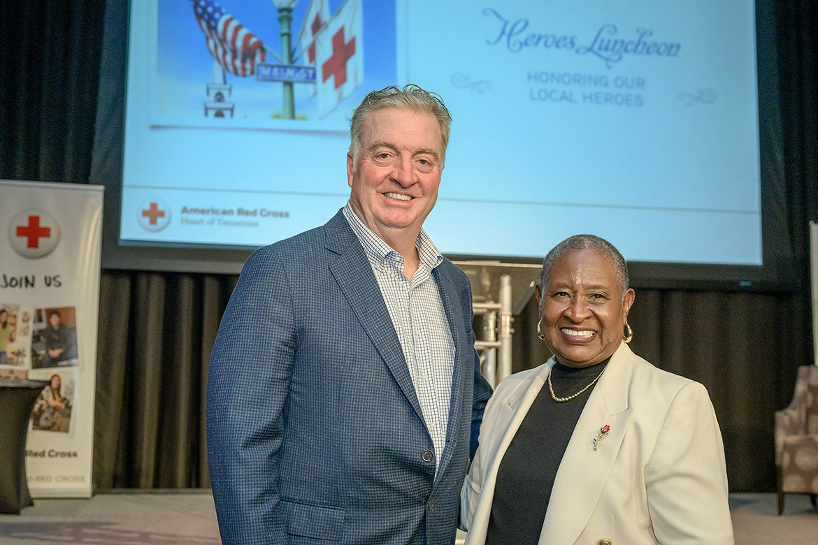 Middle Tennessee State University Board of Trustees member John Floyd, the 2026 American Red Cross Heart of Tennessee Chapter Heroes Award recipient, left, stands with the 2025 honoree Gloria Bonner, dean emeritus of the MTSU College of Education, during the Heroes Luncheon held Thursday, March 12, on campus at the Student Union Ballroom on campus in Murfreesboro, Tenn. (MTSU photo by J. Intintoli)