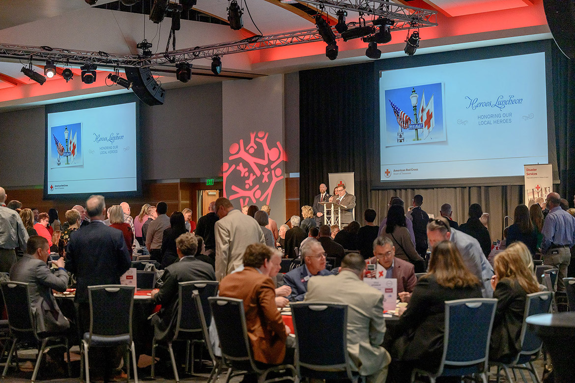 American Red Cross Heart of Tennessee Chapter Executive Director John Mitchell welcomes the crowd gathered for the nonprofit’s Heroes Luncheon held Thursday, March 12, at the Student Union Ballroom on campus in Murfreesboro, Tenn. The event annually spotlights an individual in the community who demonstrates extraordinary commitment to the well-being of others and honors those who may not seek attention or recognition. (MTSU photo by J. Intintoli)