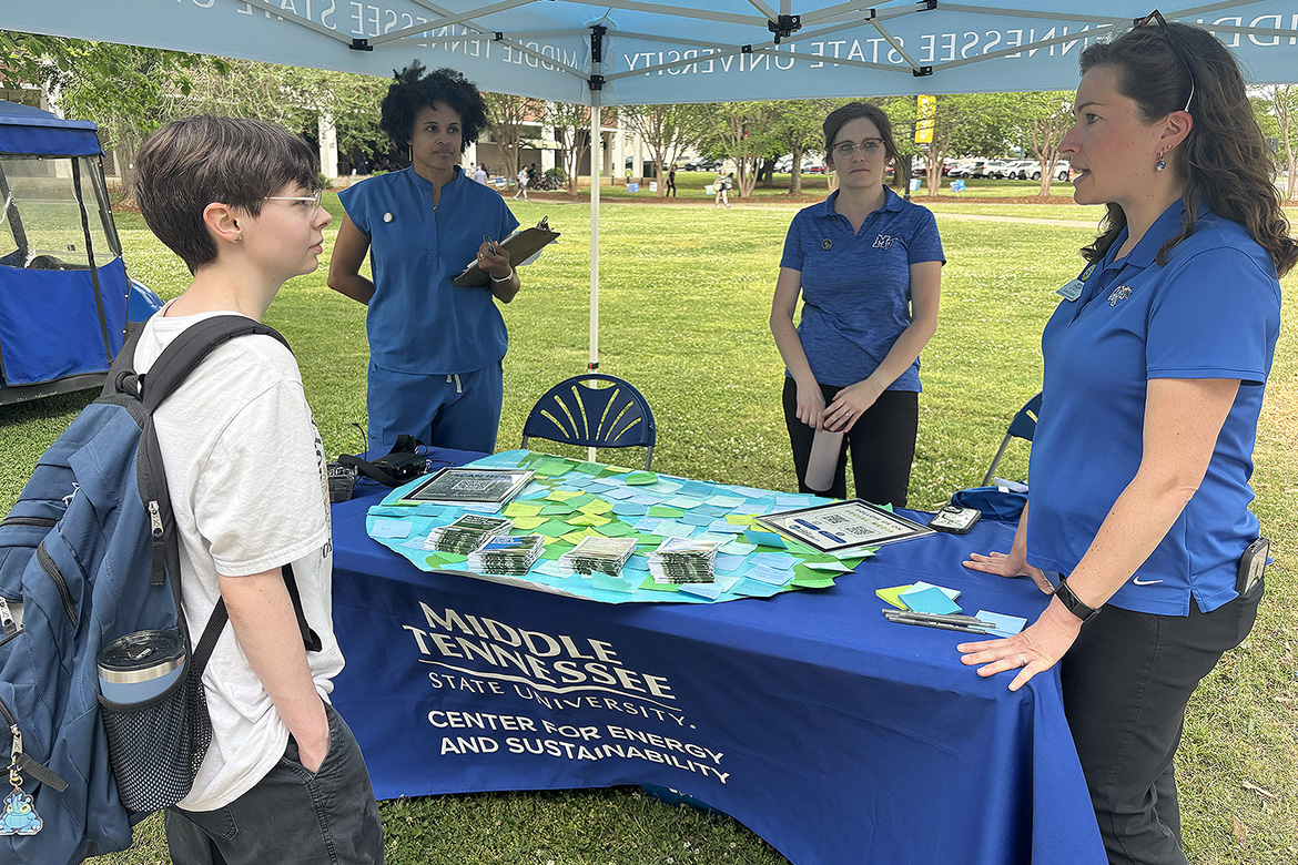 Kristin England, far right, sustainability manager for the Center for Energy and Sustainability, or CES, at Middle Tennessee State University in Murfreesboro, Tenn., talks with Logan Bowman, left, a journalism major from Cookeville, Tenn., about the newly unveiled Level II Arboretum on campus as Department of Biology lecturer Danielle Brown, second from left, and Kristen Hargis, assistant manager for CES, listen. The university hosted an unveiling ceremony on Thursday, April 16. (MTSU photo by Nancy DeGennaro)