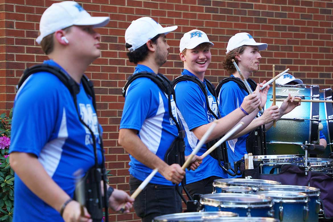 Middle Tennessee State University Band of Blue students perform the MTSU fight song as attendees arrive to the “Where Every Note Counts” scholarship campaign kickoff on April 14, 2026, at the Miller Education Center in Murfreesboro, Tennessee. Live performances showcased the range of musical experiences supported through the campaign. (MTSU photo by Mike Davis) 