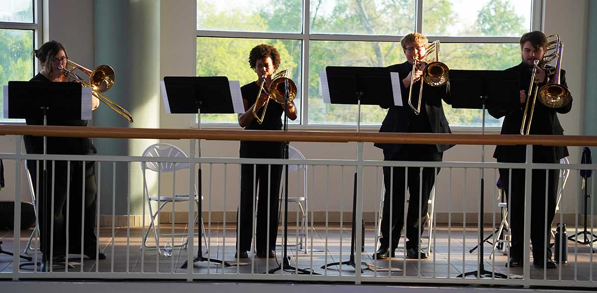 The Middle Tennessee State University Blue Bones Quartet, featuring from left to right, Reilly Harris, Jocelyn Bullock, Ryan Hungerpiller and Mitchell Elmore, all music majors, perform a trombone piece during the “Where Every Note Counts” scholarship campaign kickoff event on April 14, 2026, at the Miller Education Center in Murfreesboro, Tenn. The event featured student performances to showcase the opportunities made possible through scholarship support. (MTSU photo by Mike Davis) 