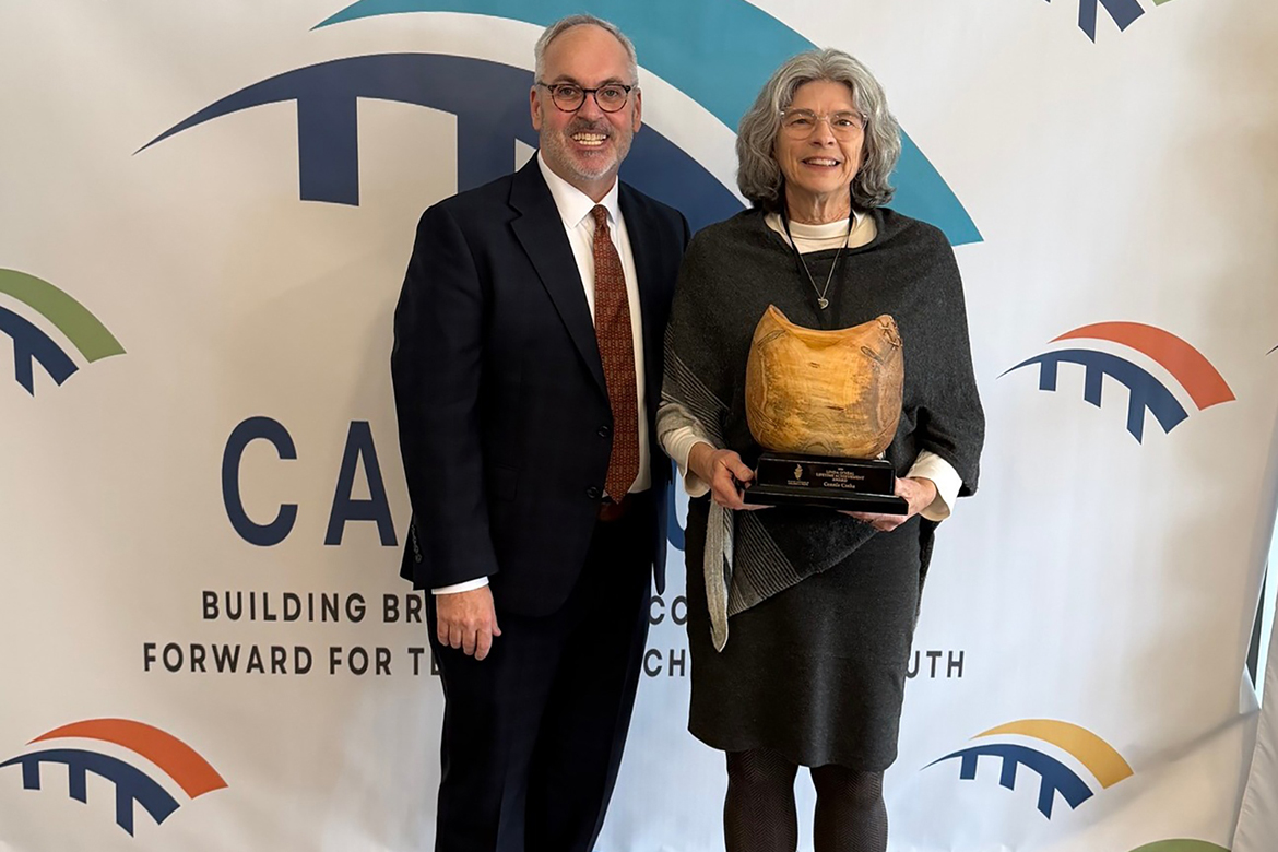 Connie Casha, right, director of the Middle Tennessee State University College of Education’s Early Learning Programs, holds the 2026 Linda O'Neal Lifetime Achievement Award presented to her by Richard Kennedy, executive director of the Tennessee Commission on Children and Youth, on March 10 at the Children's Advocacy Days 2026 at Trevecca Nazarene University in Nashville, Tenn. (Submitted photo)