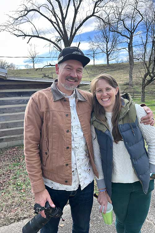 Daniel Hartmann poses with his wife in this undated photo while holding his camera. Hartmann is graduating from Middle Tennessee State University in Murfreesboro, Tenn., with an interdisciplinary studies degree two decades after he began college. (Photo submitted)