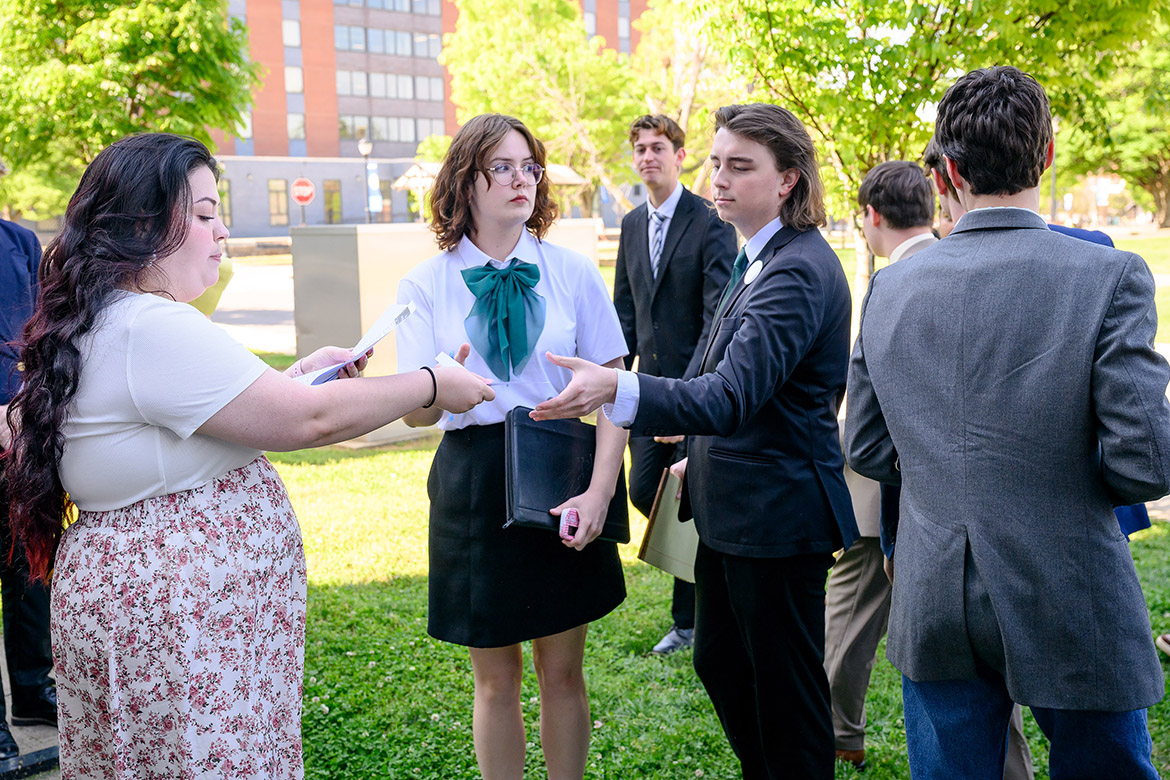 Alexandria Ritchie, left, of Abeline Christian University in Texas, assigns competitors for the next round of the International Public Debate Team National Championships tournament, hosted April 10-13 by Middle Tennessee State University on campus in Murfreesboro, Tenn. MTSU’s Blue Raider Debate Team hosted 54 colleges and over 400 students for the four-day debate competition. (MTSU photo by J. Intintoli)
