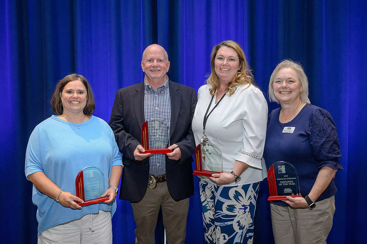 Middle Tennessee State University 2025-26 Employee of the Year recipients hold the awards they received at a reception held Wednesday, April 22, at James Union Building on campus in Murfreesboro, Tenn. Pictured, from left, are Jackie Victory, director of Campus Activities and Strategic Marketing in the Office of Student Organizations and Service, Administrative Employee of the Year; MTSU Police Detective Tommy Roberts, Technical/Service Employee of the Year; Sarah Pruitt, coordinator in the Department of Social Work, Classified Employee of the Year; and Billie Jean Brown, University College senior administrative associate, Administrative Professional Employee of the Year. (MTSU photo by Andy Heidt)