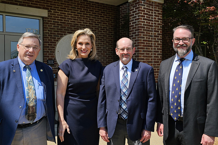 Pictured, from left, are Middle Tennessee State University Honors College Dean John Vile, Managing Director of Carter Global Beverly Brooks Thompson, Phi Kappa Phi Executive Director Bradley Newcomer, and MTSU Phi Kappa Phi Chapter President and Honors College Associate Dean Philip Phillips outside the Paul W. Martin Sr. Honors Building on campus in Murfreesboro, Tenn. (MTSU photo by Robin E. Lee)