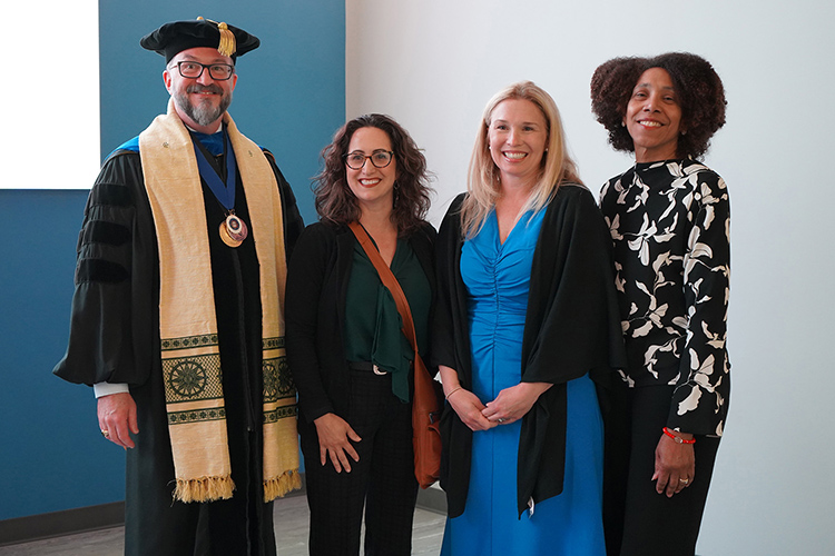 Phi Kappa Phi honors influential faculty designated by student initiates at each ceremony. In total, 21 faculty members were recognized during the Spring 2026 initiation ceremony. From left, Middle Tennessee State University Chapter President Philip Phillips stands with designated influential faculty members in attendance: Andrea Georgiou, Elizabeth Rossi, and Mimi Thomas. (MTSU photo by Robin E. Lee)