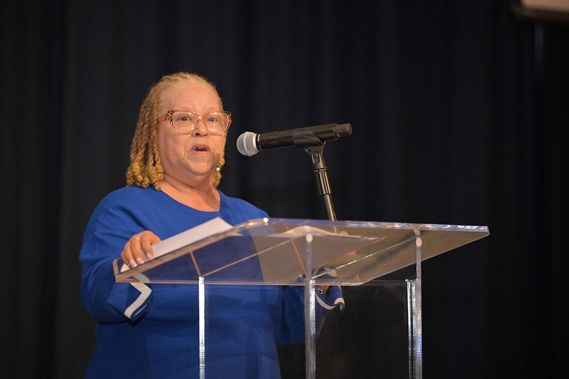 Carmelita Dotson, associate professor of social work at Middle Tennessee State University in Murfreesboro, Tenn., and the 2025 John Pleas Faculty Award recipient, welcomes the crowd to the 2026 award ceremony held Tuesday, March 31, in the James Union Building on campus. The event honored this year’s recipient Samuel Haruna, associate professor of soil science and associate dean for academic programs in the College of Basic and Applied Sciences. (MTSU photo by James Cessna)