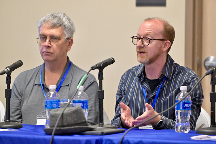 Middle Tennessee State University Computer Science professor Joshua Phillips, right, and Physics and Astronomy professor John Wallin participate in one of the panels offered at the Tech Vision 2026 conference held April 10 at the Miller Education Center on campus in Murfreesboro, Tenn. (MTSU photo by Andy Heidt)
