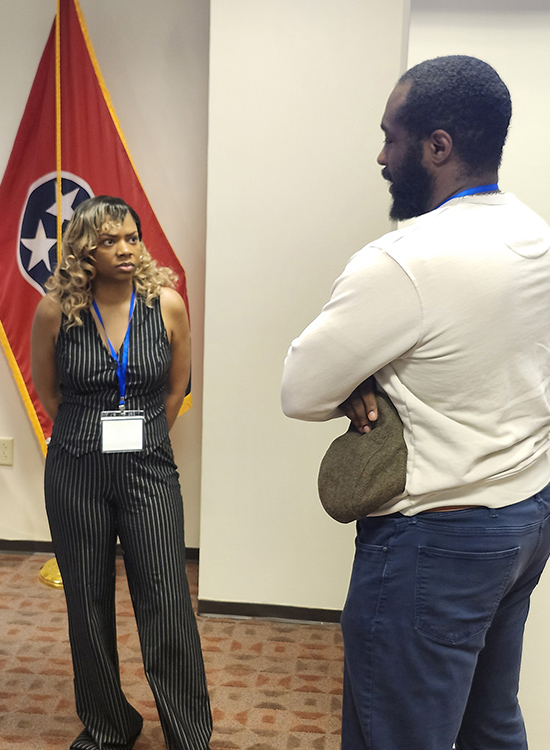 Shanayla Sweat, left, an organizational change management consultant, speaks with an attendee at Middle Tennessee State University’s Tech Vision 2026 conference, held April 10 at the Miller Education Center on campus in Murfreesboro, Tenn. Sweat was a panelist in a breakout session on AI and workforce readiness. (MTSU photo by Jimmy Hart)