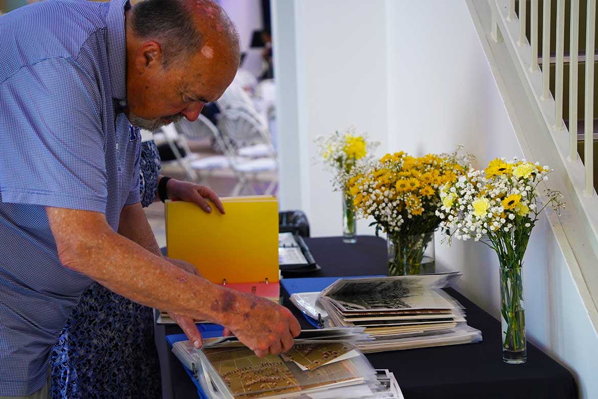 Kickoff looks through old photos and memorabilia from the School of Music, April 14, 2026, at the Miller Education Center in Murfreesboro, Tennessee. The event brought together students, faculty, alumni, and community members to support music education. (MTSU photo by Mike Davis)