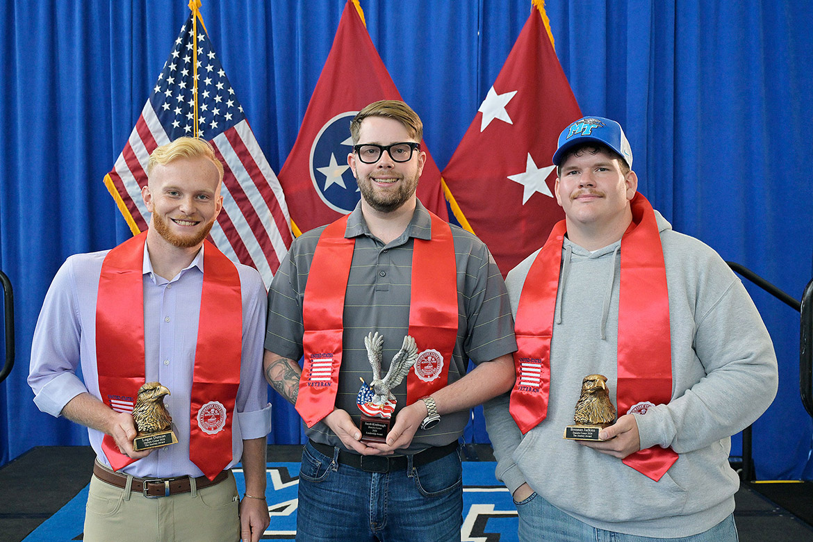 Veterans Leadership Award winner Jacob Kimbrough of Murfreesboro, Tenn., center, stands with Journey Award winners Logan Duncan of Lafayette, Tenn., at left, and Brennan Judkins of Cross Plains, Tenn., at the 33rd Middle Tennessee State University Graduating Veterans Stole Ceremony held Thursday, May 7, 2026, at Miller Education Center. The event is hosted by the Charlie and Hazel Daniels Veterans and Military Family Center each semester prior to MTSU commencement ceremonies, which took place Friday-Saturday, May 8-9, on campus in Murfreesboro, Tenn.. (MTSU photo by Andy Heidt)