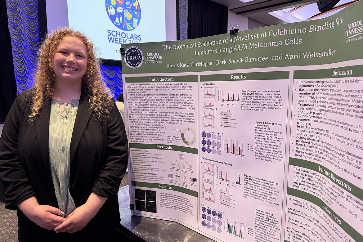 Alexis Katz, a biology major at Middle Tennessee State University in Murfreesboro, Tenn., stands beside her research poster presentation at the university’s Scholars Week 2026 showcase.