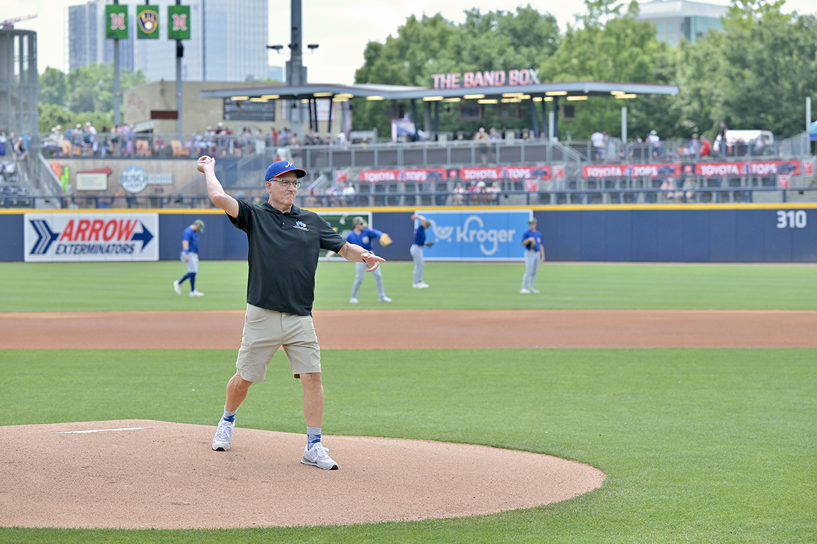 Mark Byrnes, provost at Middle Tennessee State University, throwing first pitch from the mound at First Horizon Park.
