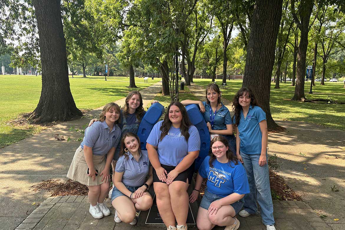 Callie Welch, front left, poses for a photo with other tour guides at the horseshoe on Middle Tennessee State University's campus in Murfreesboro, Tennessee. (Submitted photo)