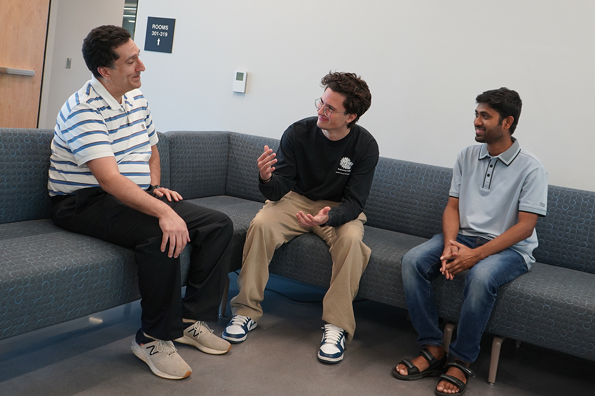 Antonio Saavedra, left, instructor for the Engineering Technology Department at Middle Tennessee State University in Murfreesboro, Tenn., chats with mechatronics engineering major Dalyn Wachala, center, and Arif Hossain, assistant professor in the Engineering Technology Department.