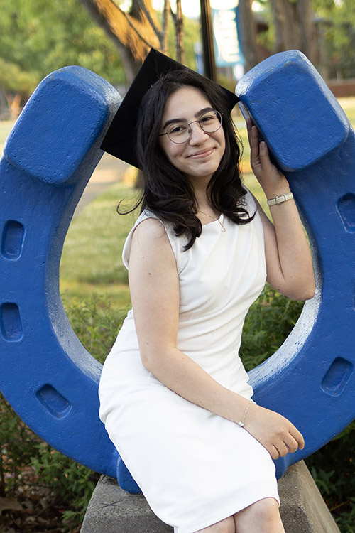 Spring 2026 graduate Gamze Mert at the horseshoe in Walnut Grove on the Middle Tennessee State University campus in Murfreesboro, Tenn.