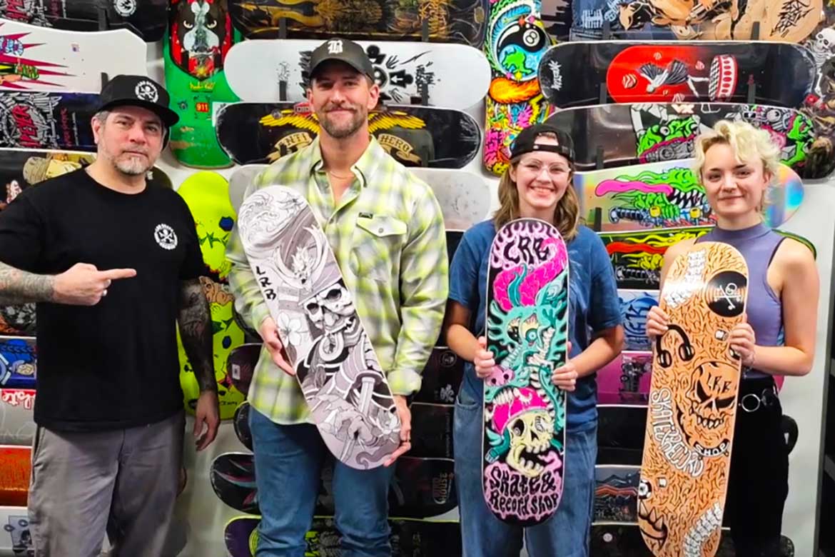Lila Gordon, a senior graphic design major at Middle Tennessee State University, second from right, poses with fellow participants and a local skateboard shop owner while holding their entries for the LRB Skateboard Illustration Challenge. Gordon won first place in the competition, where participants had 15 hours to create an original design. (Submitted photo)