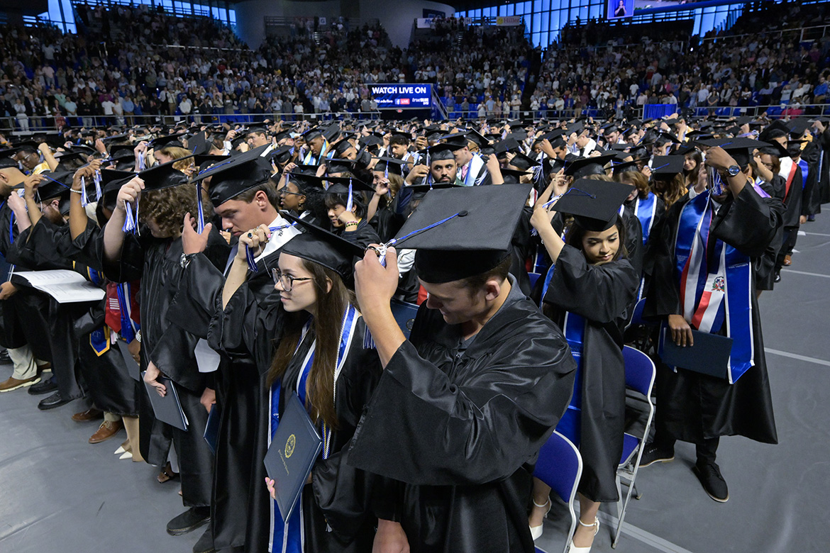 Middle Tennessee State University Class of 2026 graduates move their tassels from the right to the left at the conclusion of the Friday, May 8, spring commencement ceremony.