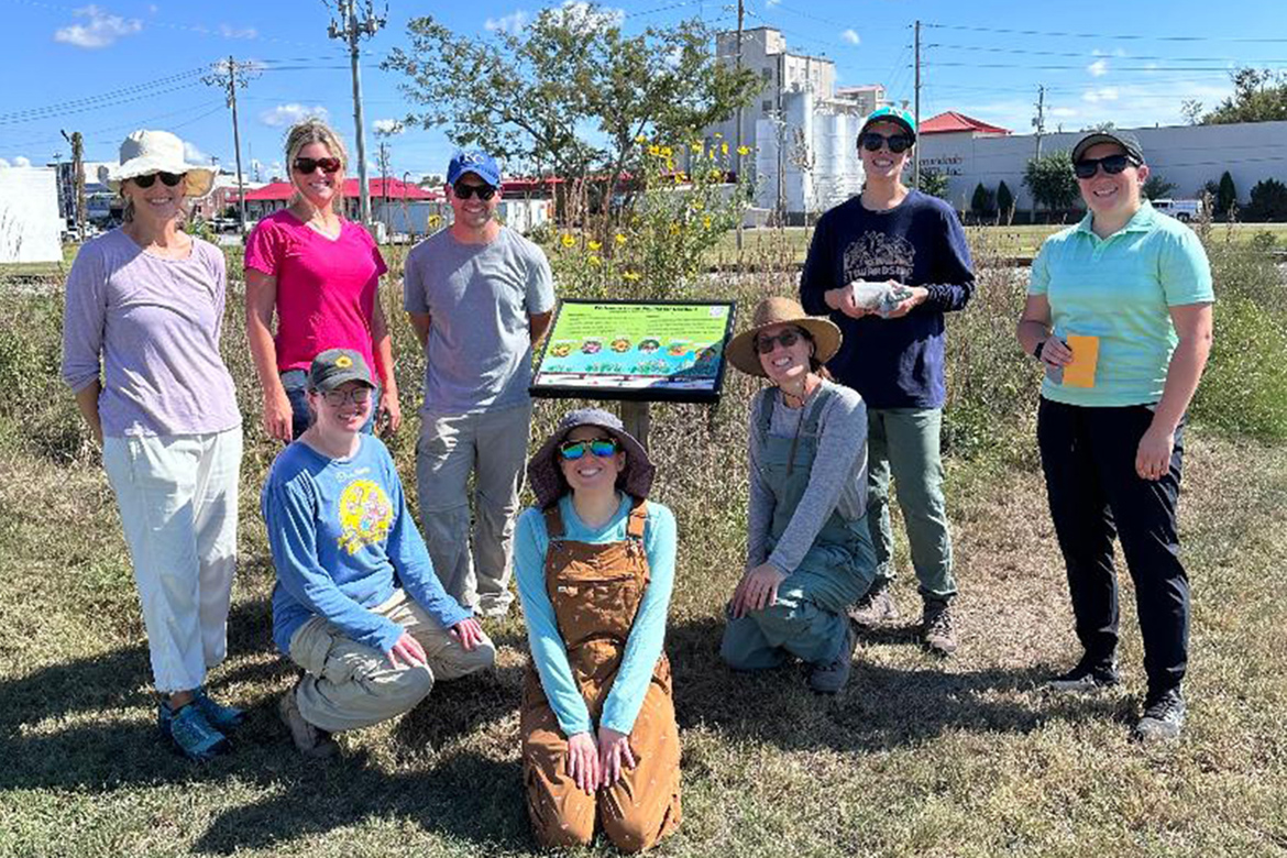 Middle Tennessee State University public health doctoral student Vinny Black, back row, third from left, stands with fellow volunteers at a tree planting project with the Tennessee Environmental Council, or TEC. The nonprofit agency named Black as Volunteer of the Year for 2026. (Submitted photo)