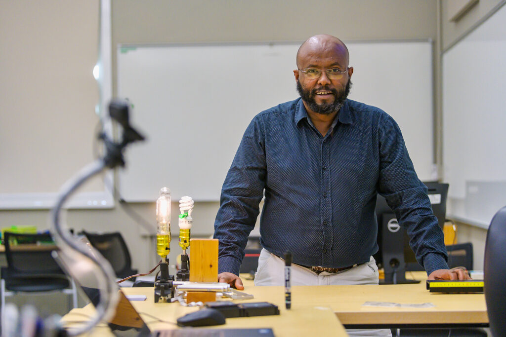 Daniel Erenso, Physics & Astronomy faculty, in Wiser-Patten Science Hall. (Photo: Andy Heidt)