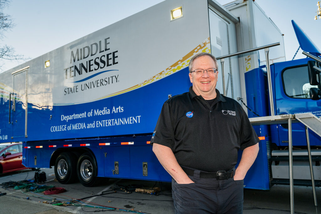 MTSU Department of Media Arts professor Robert "Bob" Gordon Jr. stands by the College of Media and Entertainment's $1.7 million Mobile Production Lab, aka "The Truck," outside the Boutwell Dramatic Arts Auditorium as his students work inside Tucker Theatre to record the MTSU Dance Theatre's 2020 Fall Dance Concert for broadcast Saturday, Nov. 21. (MTSU photo by Andy Heidt)