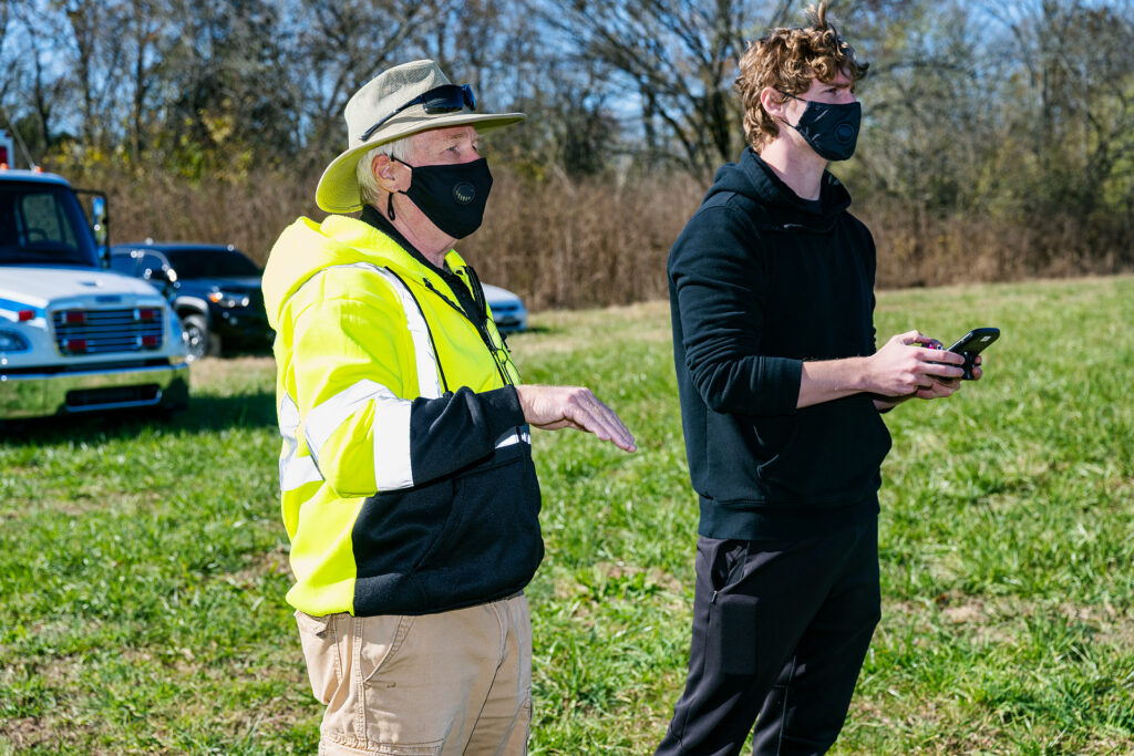 Kevin Corns, Aerospace faculty, left, talks with student Calvin Harris (Sr.), right. (Photo: Andy Heidt)