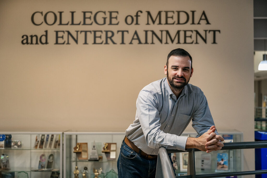 Matthew Taylor, Journalism and Strategic Media faculty, in and around the Bragg Media and Entertainment Building. (Photo: Andy Heidt)
